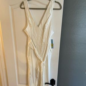 Brand new Antonio Melani white jumpsuit. Size 12.